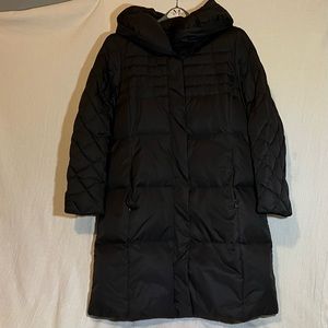 Black tufted winter coat